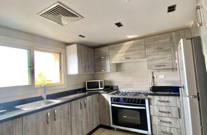 Apartment - 2 Bedrooms - 3 Bathrooms for sale in Amberville - 6 October City - Giza